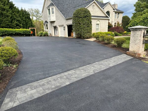 Asphalt Driveway Installation With Paved Border Entrance