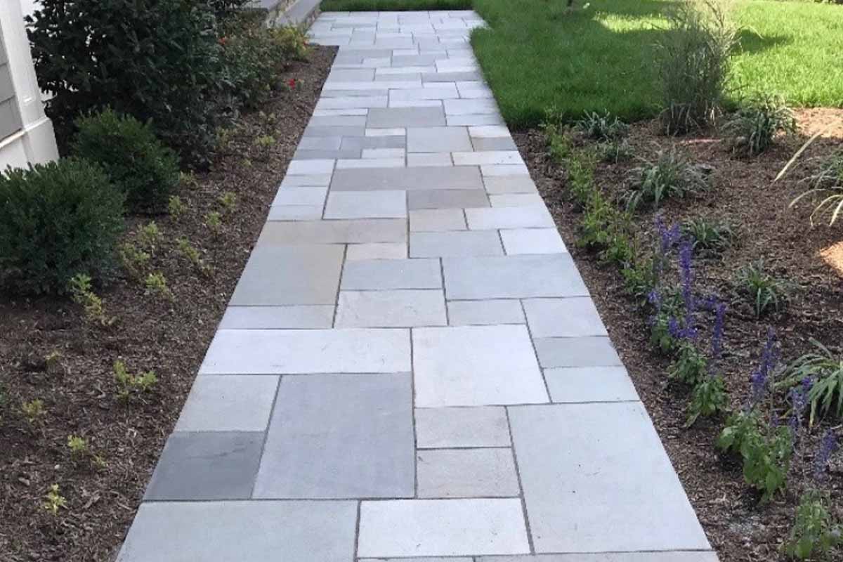 Our walkway paving team working in Babylon