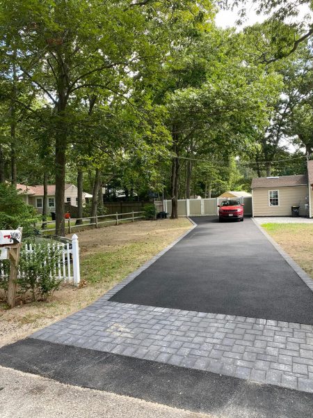 Our asphalt pavers working in Bayport